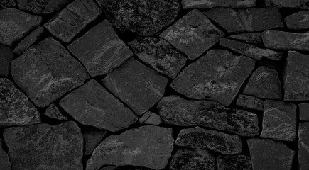Schwarze Steine als Hintergrund
