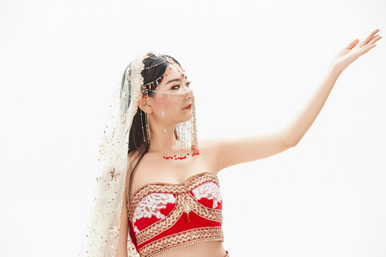 Belly dancers dressed in traditional Indian costumes