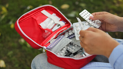 first aid kit. First aid kit. Woman and first aid kit.High quality photo