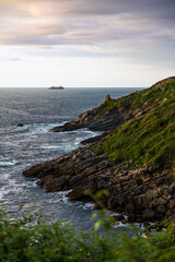 Rocky Coastline Under Cloudy Skies at the Foot of Mount Jaizkibel Around Cape Higuer