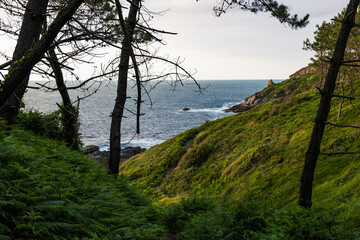 Rocky Coastline Under Cloudy Skies at the Foot of Mount Jaizkibel Around Cape Higuer