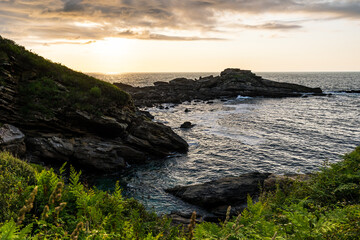 Rocky Coastline Under Cloudy Skies at the Foot of Mount Jaizkibel Around Cape Higuer