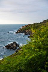 Rocky Coastline Under Cloudy Skies at the Foot of Mount Jaizkibel Around Cape Higuer
