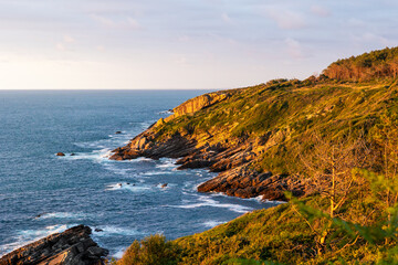 Rocky Coastline at Sunset at the Foot of Mount Jaizkibel Around Cape Higuer