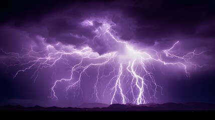 Powerful lightning strikes a dramatic purple sky.