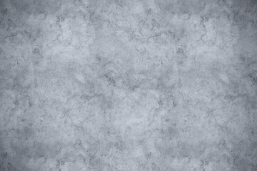 Smooth textured gray concrete wall with a subtle mottled pattern and a hint of grunge, creating a versatile background