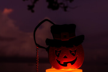 Concept: Halloween beach and ocean background with pumpkin ghost witch ghost dark scary tone