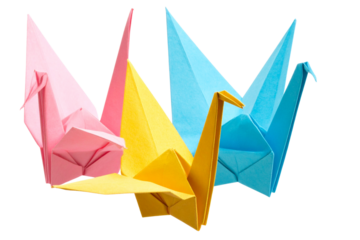 Set of Three Colorful Folded Origami Cranes, isolated on a transparent background