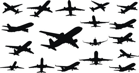 Collection of diverse airplane silhouettes in flight