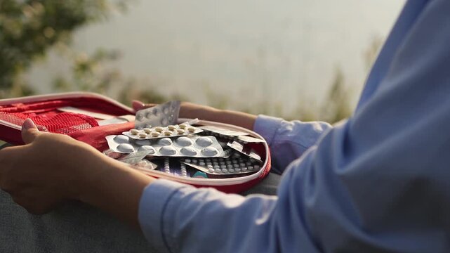 First aid kit. Pond. Slow motion. High quality video in 4K format.