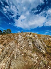 Rocky Hill Under Blue Sky
