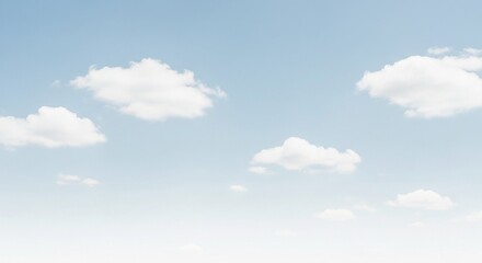 Fototapeta premium A serene blue sky with fluffy white clouds provides a beautiful natural backdrop, ideal for nature, travel, and environmental themes.