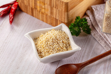 Raw dry sesame seeds heap