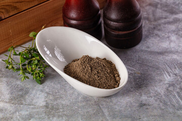 Ground dry black pepper powder