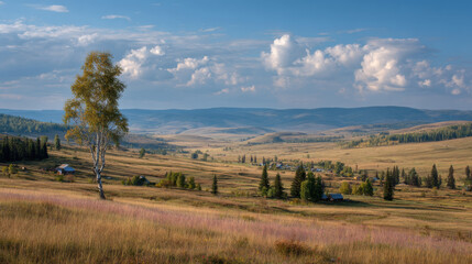 Fototapeta premium Wide open rural grassland landscape with scattered trees under blue sky ideal for nature tourism farming countryside and outdoor scenic photography