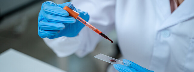 banner background of laboratory, several researchers conduct blood tests and analysis on samples, using science and medicine to advance their research and develop new treatments.