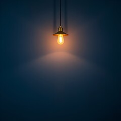 Dusty Navy Blue Wall with Brass Pendant Lamp and Warm Light Glow