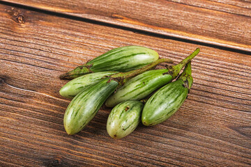 Small organic young green eggplant