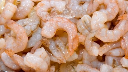 Fresh peeled shrimp in market. fresh ingredients for seafood. suitable for background