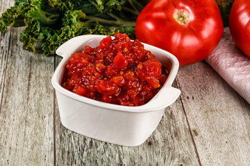 Diced ripe tomato with sauce