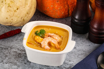 Pumpkin cream soup with prawns