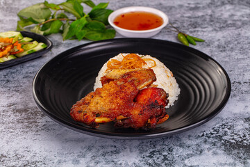 Spicy roasted chicken wing with rice