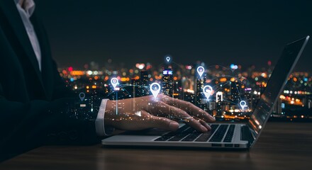 Global Network Connection: Person using laptop with digital map overlay and location pins at night city background