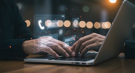 Hands typing on a laptop with futuristic digital interface showing contact icons and data