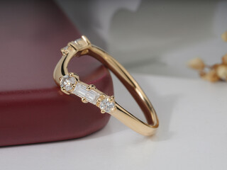 Gold Diamond engagemenet ring for women isolated in white podium 