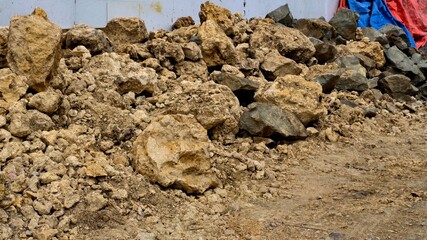 Pile of Rocks and Soil for Construction, Rough Textures and Mixed Rock Sizes on a Construction Site