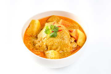 thai yellow chicken curry and roti in the white bowl