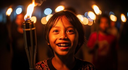 happy child celebrates indonesian independence day with torch