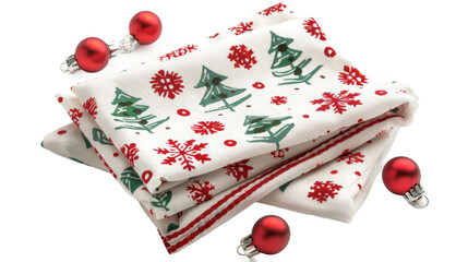 A festive arrangement featuring decorative holiday napkins adorned with Christmas trees and snowflakes, complemented by shiny red ornaments, ideal for seasonal dining and celebrations