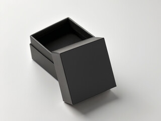 Empty black jewelry or gift box with the lid off. Elegant, minimalist packaging mockup on a white background.