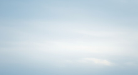 Obraz premium Faintly Cloudy Light Blue Sky Background With Subtle Texture clouds