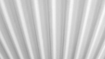 Obraz premium Converging white stripes forming dynamic geometric pattern, representing technological innovation and sleek minimalist design concept