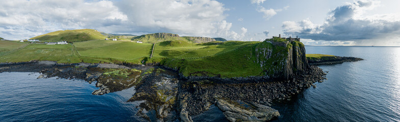 Aerial view of Duntulm Castle stands ruined on the north coast of Trotternish, on the Isle of Skye in Scotland, near the hamlet of Duntulm