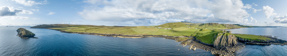 Obraz premium Aerial view of Duntulm Castle stands ruined on the north coast of Trotternish, on the Isle of Skye in Scotland, near the hamlet of Duntulm
