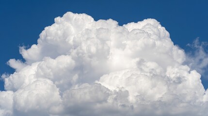 Naklejka premium Fluffy cumulus cloud in blue sky, embodying peace and vastness of summer