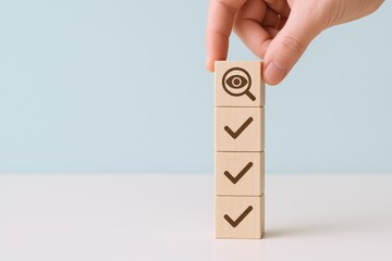 Hand Stacking Wooden Blocks with Magnifying Glass and Check Marks for Checklist Concept
