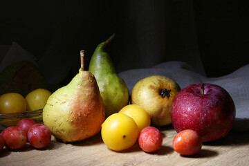 Still life with yellow and red fruits