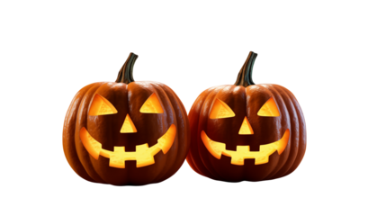 Spooky jack-o'-lanterns grinning with warm, inviting light, perfect for Halloween celebrations, autumn designs, and festive seasonal promotions, creating a cheerful ambiance