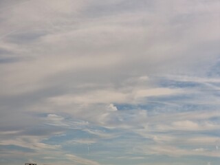 Serene Sky with Soft Clouds