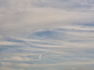 Serene Sky with Soft Clouds