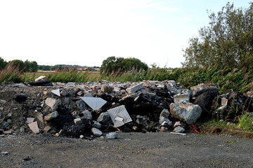 Large Pile of Roadworks Debris on a Rural Country Roadway