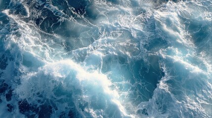Fototapeta premium A stunning aerial view of turbulent ocean waves, capturing the beauty and power of nature's watery depths.