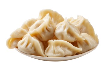 Pile of steamed dumplings on a white plate isolated on a transparent background food cooked