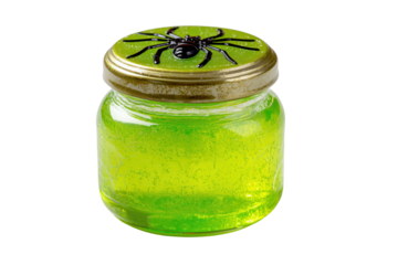 Small glass jar filled with bright green glittery liquid and a black spider on lid isolated on a transparent background