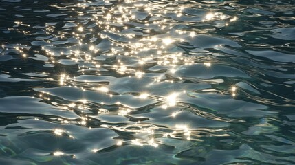 Sunlight Reflections on Calm Water Surface with Gentle Ripples
