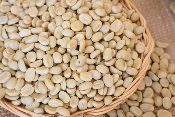 Coffee beans showing various stages of roasting from raw